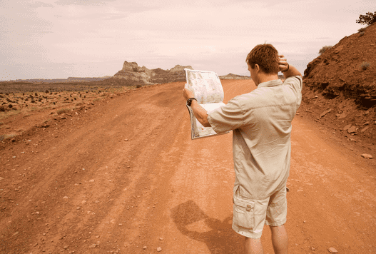 Lost man holding map